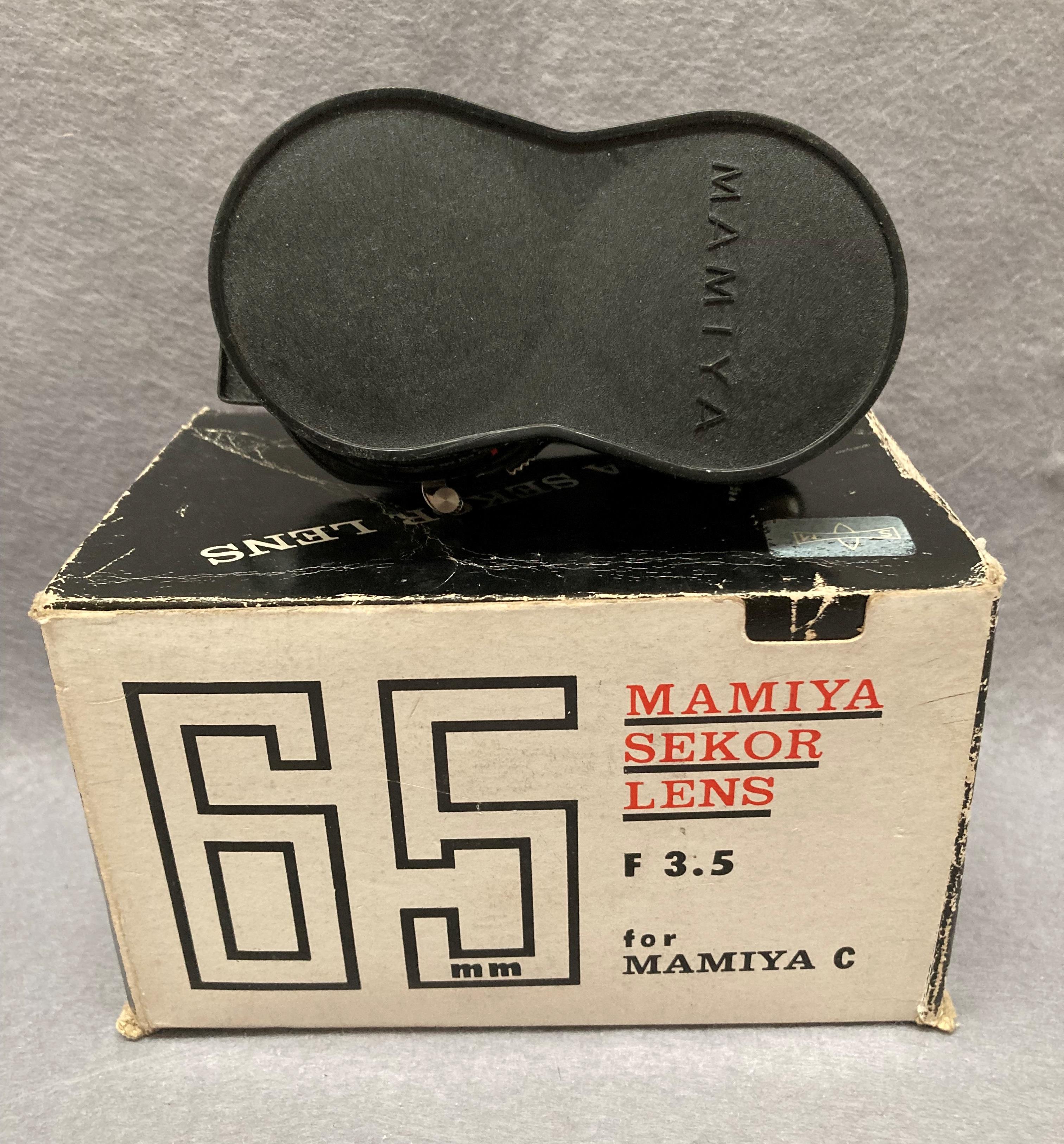 A Mamiya Sekor lens 65mm f3.