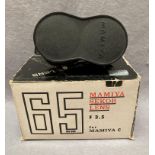 A Mamiya Sekor lens 65mm f3.