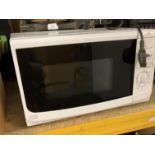 A Sainsbury's 17L microwave oven (PO)