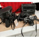 Pair of Prinz 8 x 40 binoculars in black leather case,