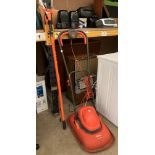 A Flymo Turbo Lite 330 lawnmower and a Timberton TASG01 branch lopper (P0)