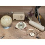 Champion radio in cream Bakelite case, a Pifco vintage fan, a speaker box No 0-200,