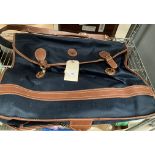 An Antler dark blue fabric and brown leather suit/travel bag (S1)