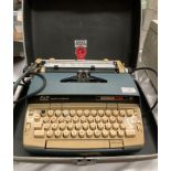 A Smith Corona Electra 110 portable electric typewriter (flex cut off,