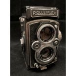 A Franke and Heidecke Rolleiflex DBP DBGM Syncro-Compur camera with Xenar 1:35/75 and Heidosmat 1:2.