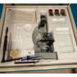 A Prinz model 180 750x microscope outfit (boxed)