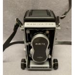 A Mamiya C33 Professional camera with Mamiya-Sekor 1:2.