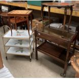 An oak two tier tea trolley with single drawer, a gilt framed three tier tea trolley,