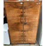 A walnut gentleman's wardrobe 84cm x 137cm high