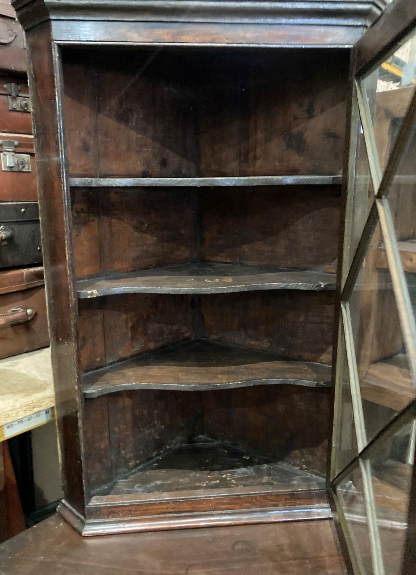 An oak two section corner cupboard with single glazed door over single door base, - Image 2 of 5