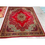 A large Woodward Grosvenor Wilton 100% wool red ground carpet square with floral design,