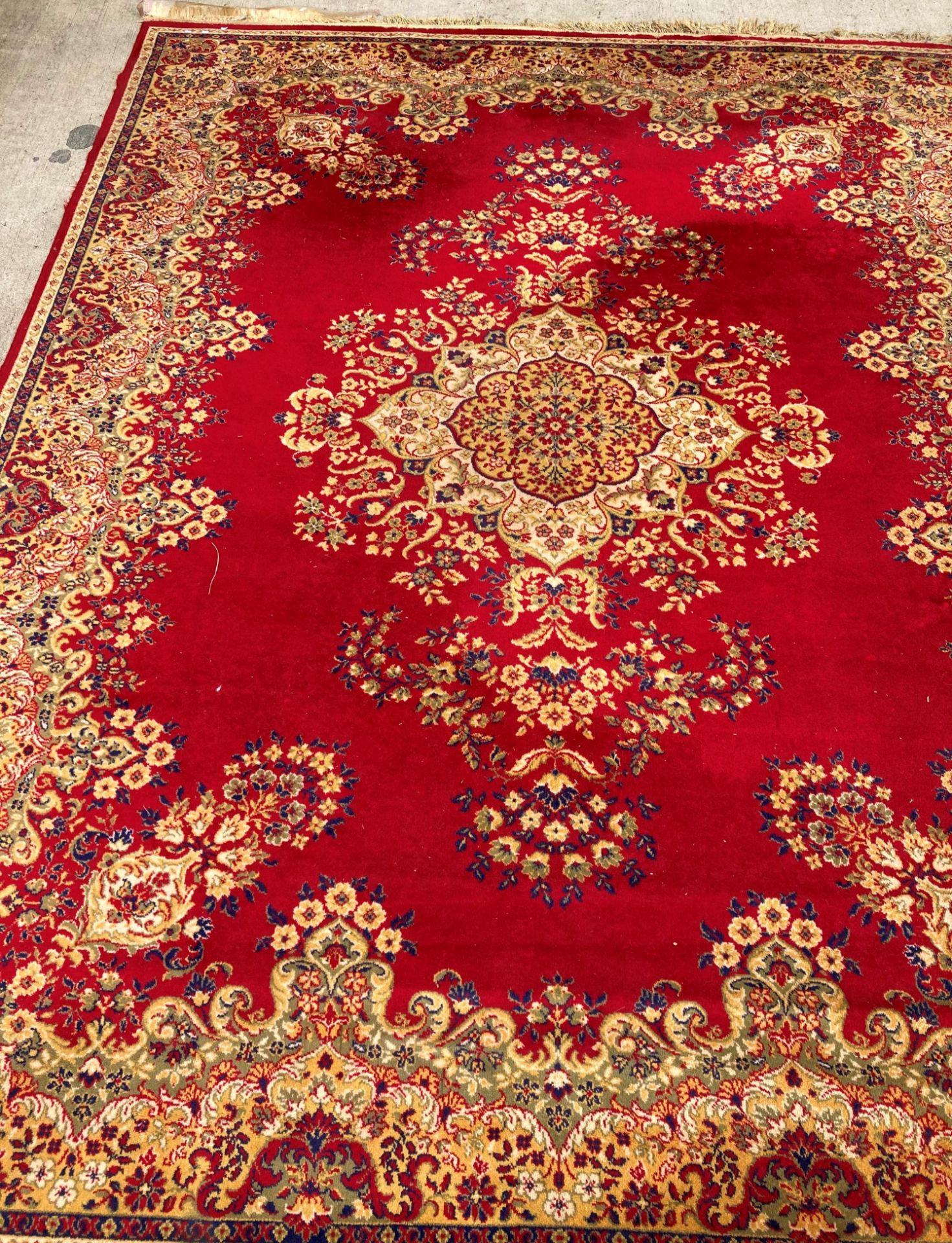 An Arakstan? 100% wool pile deluxe red ground carpet square with floral design, - Image 3 of 3