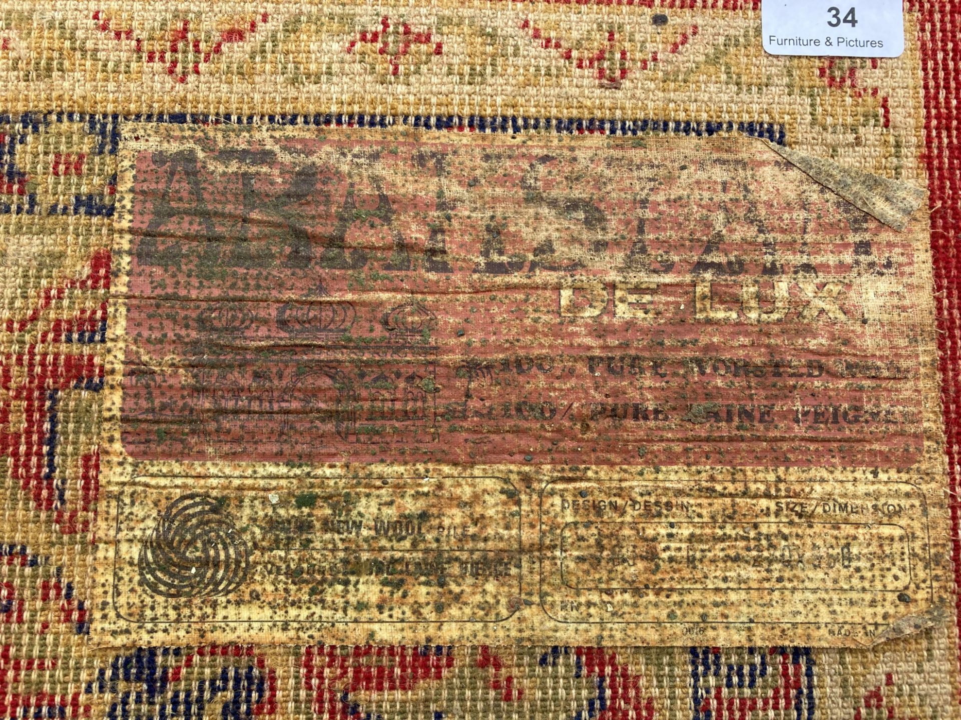 An Arakstan? 100% wool pile deluxe red ground carpet square with floral design, - Image 2 of 3