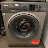 A Hotpoint 7kg automatic washing machine in grey