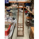 An oak hat and coat stand with square supports and metal tray 180cm,