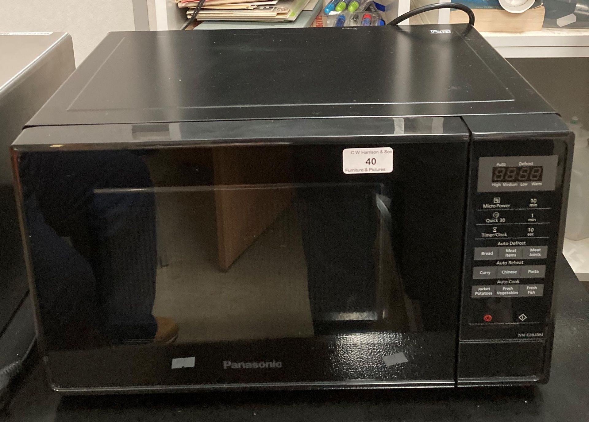 A Panasonic NN-E28JBM microwave oven.