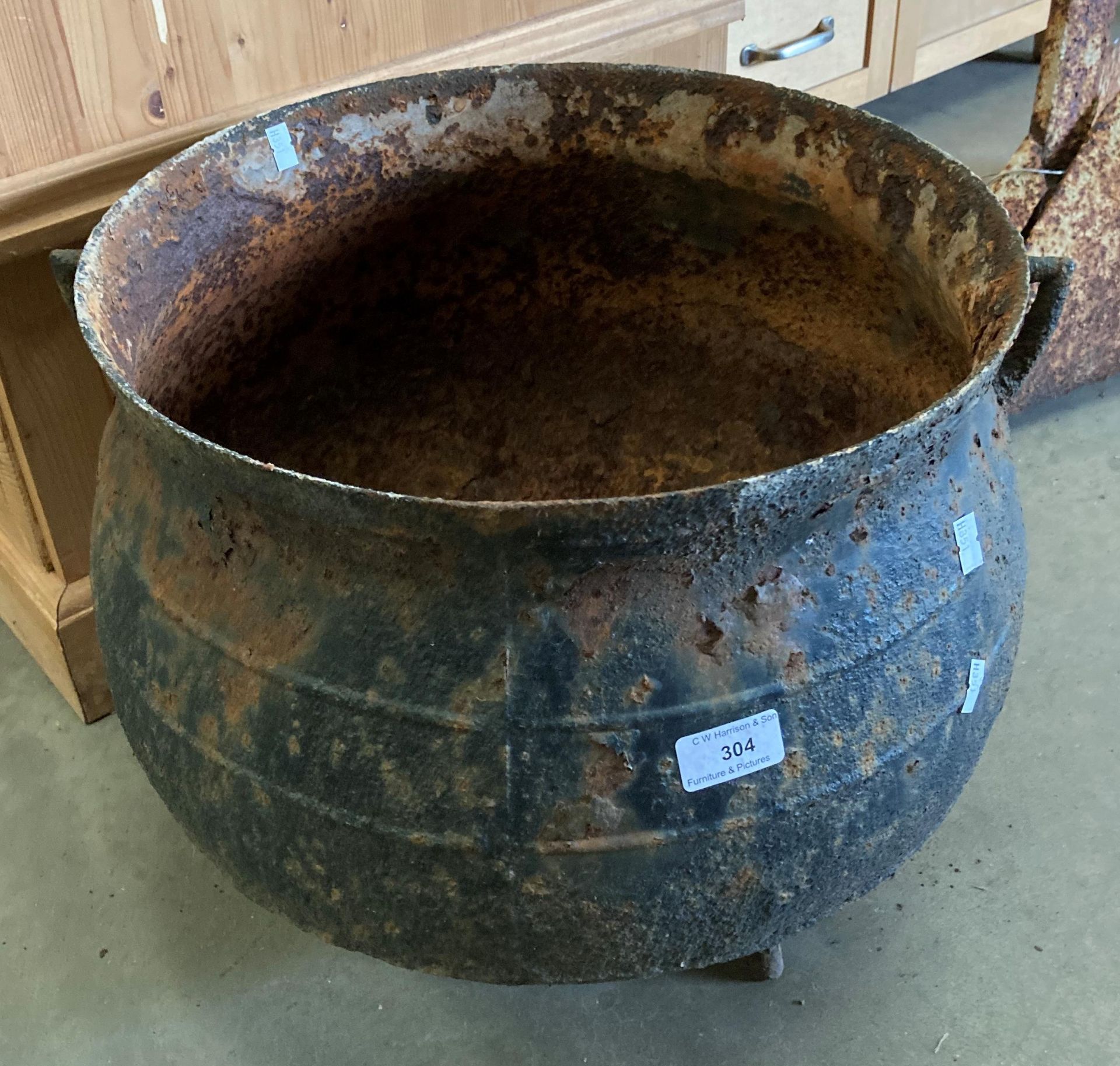 Black cast iron cauldron - has a crack on the side 40cm diameter x 35cm high