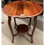 A mahogany window table with undertray 57cm diameter.