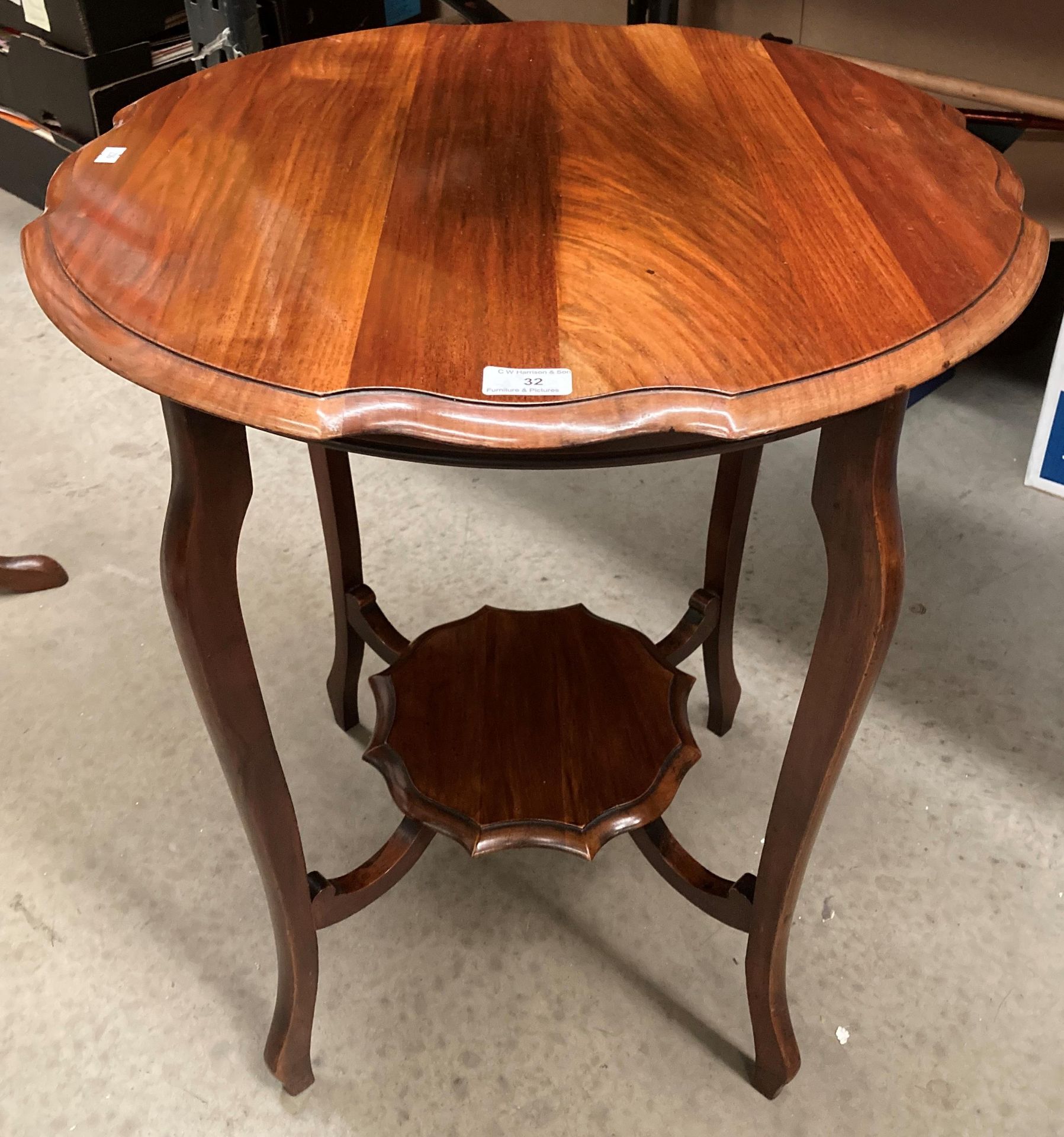 A mahogany window table with undertray 57cm diameter.