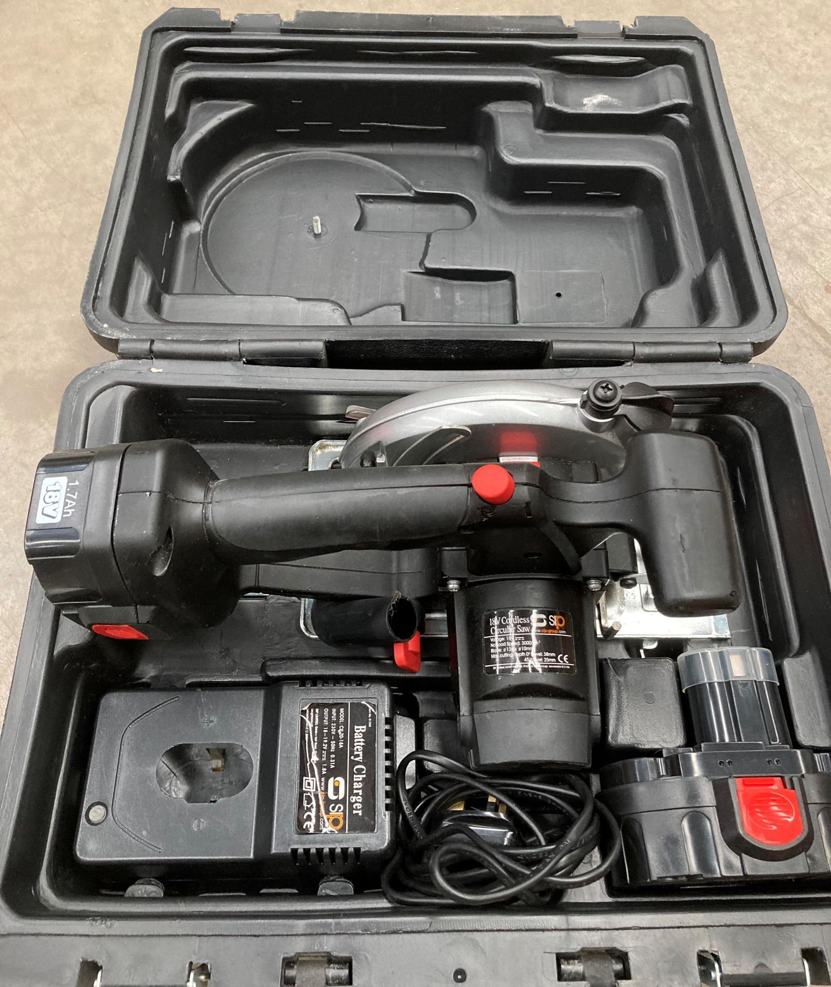 An SP 18v cordless circular saw with two batteries and charger in case.