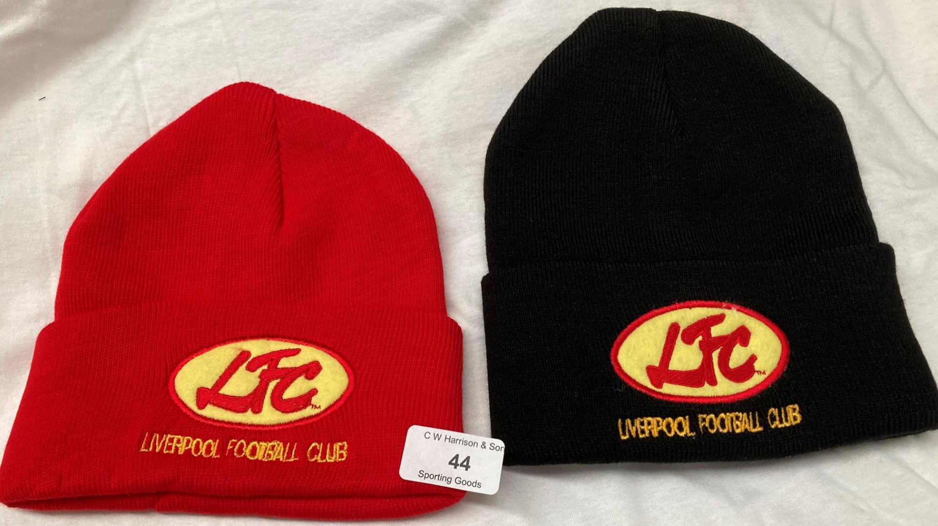 170 x black and red Liverpool Football Club branded beanies