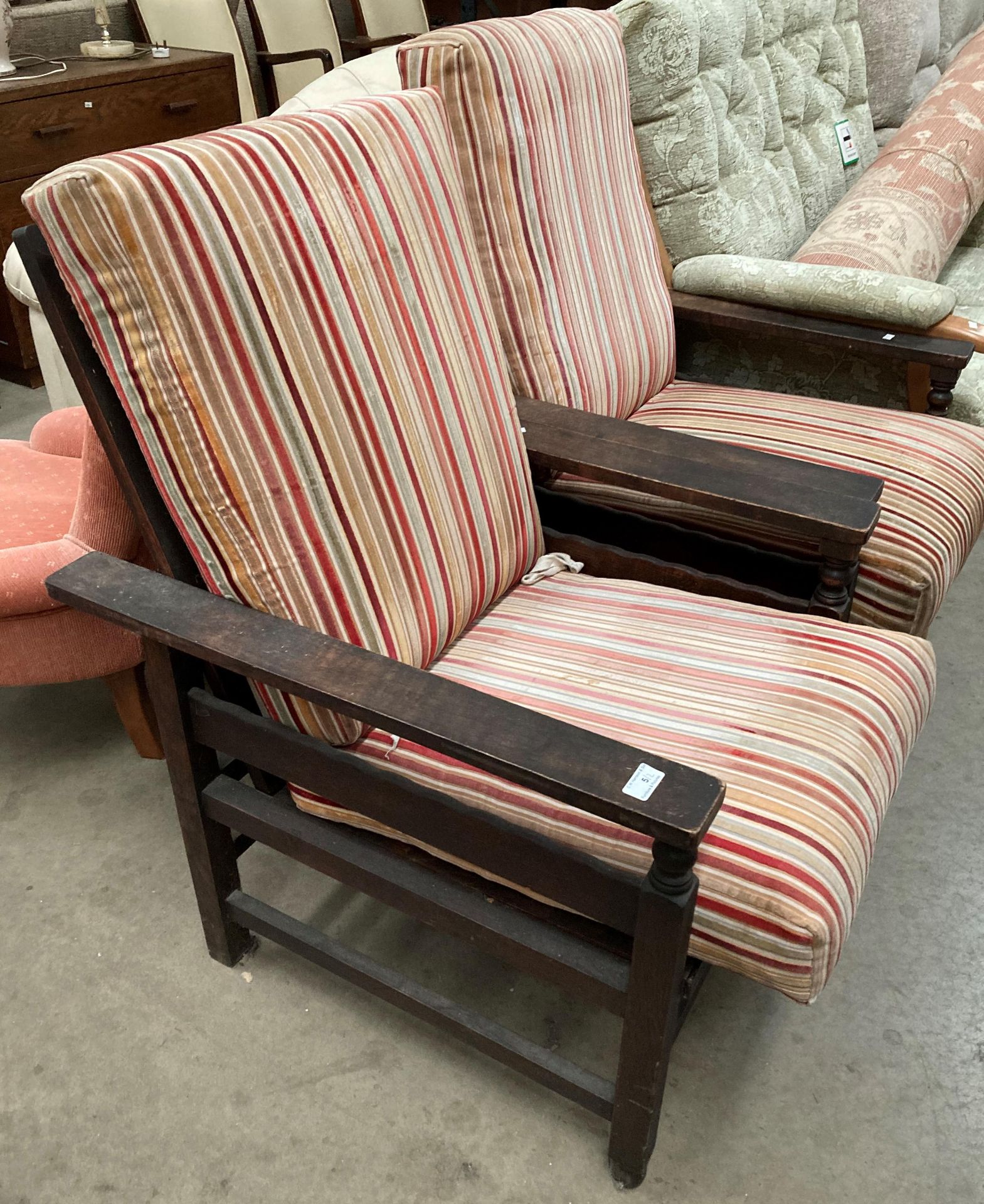 A pair of oak framed armchairs with red, orange and pink fabric seats and backs. - Image 3 of 3