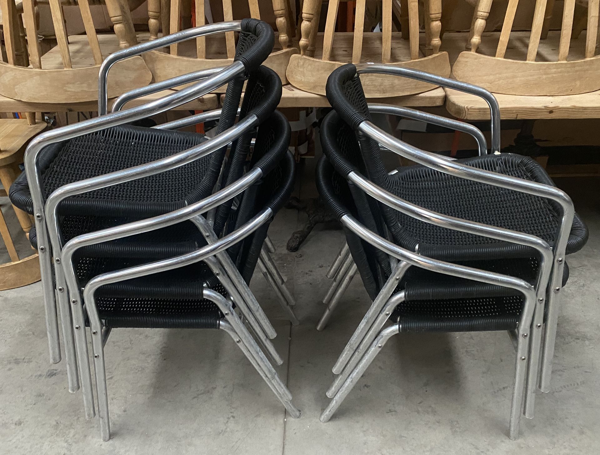 7 x Chrome Framed Stacking Outdoor Armchairs with Black Plastic Weave Seats - Image 2 of 2