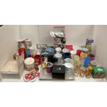 Contents to part of table - fifty plus assorted Disney related items including cups, mugs, bowls,