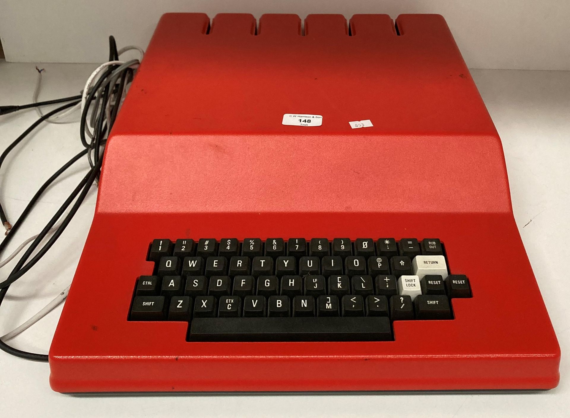 Cumpukit UK101 a single board computer in a red casing and three assorted Compukit UK101 software