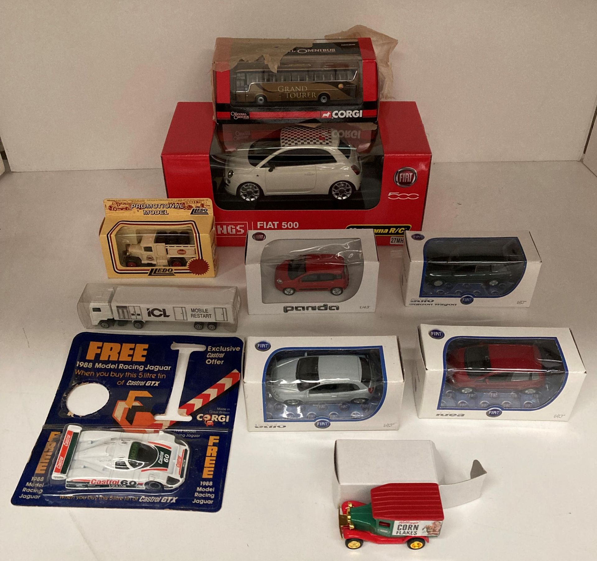 Fiat 500 remote control car by Motorama R/C and four assorted diecast metal Fiat's,