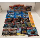 Twenty two assorted Lego packs including The Hobbit, Star Wars, City, NinjaGo, Chima,