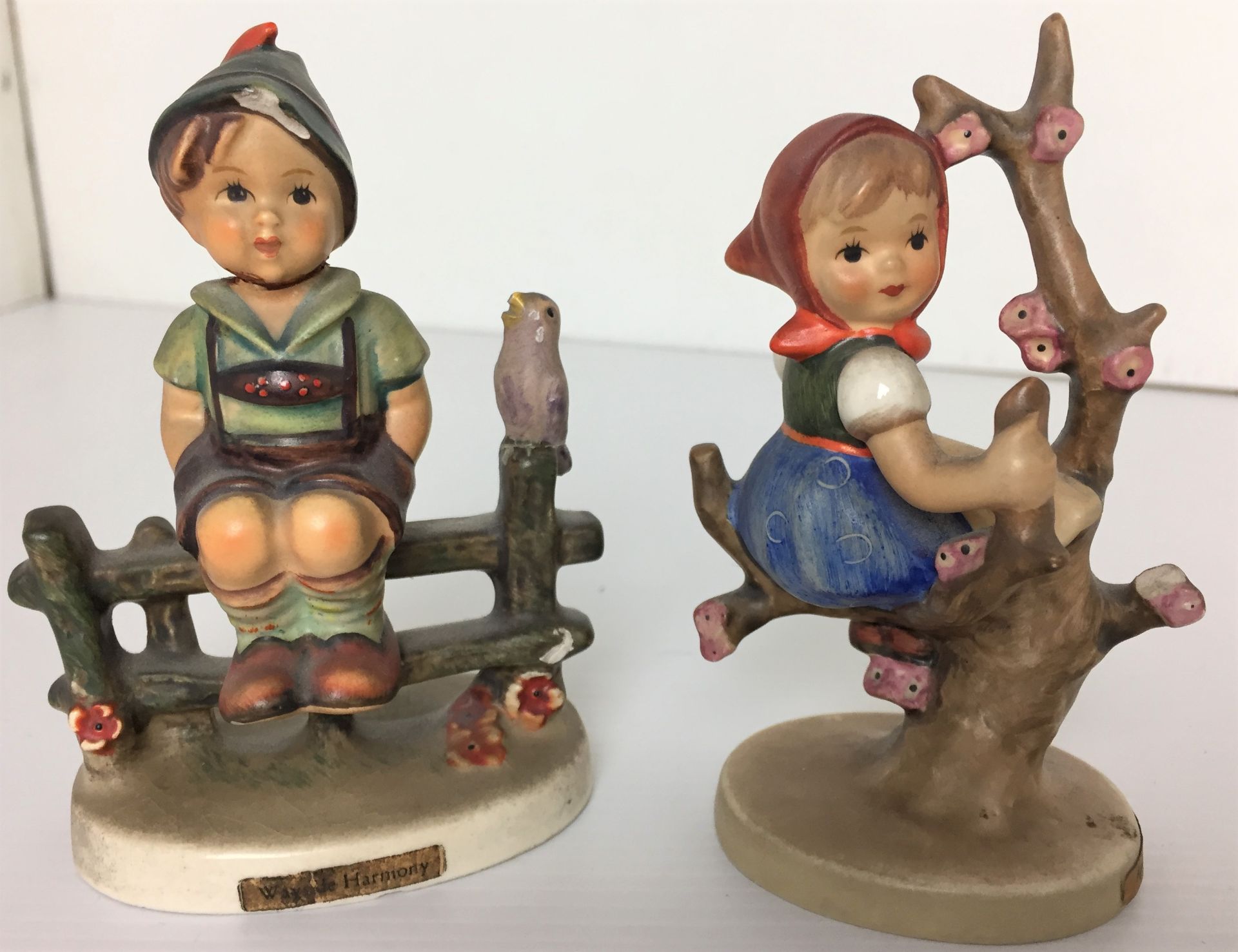 Two Goebel figurines Appletree Girl and Wayside Harmony maximum 10cm high Y10