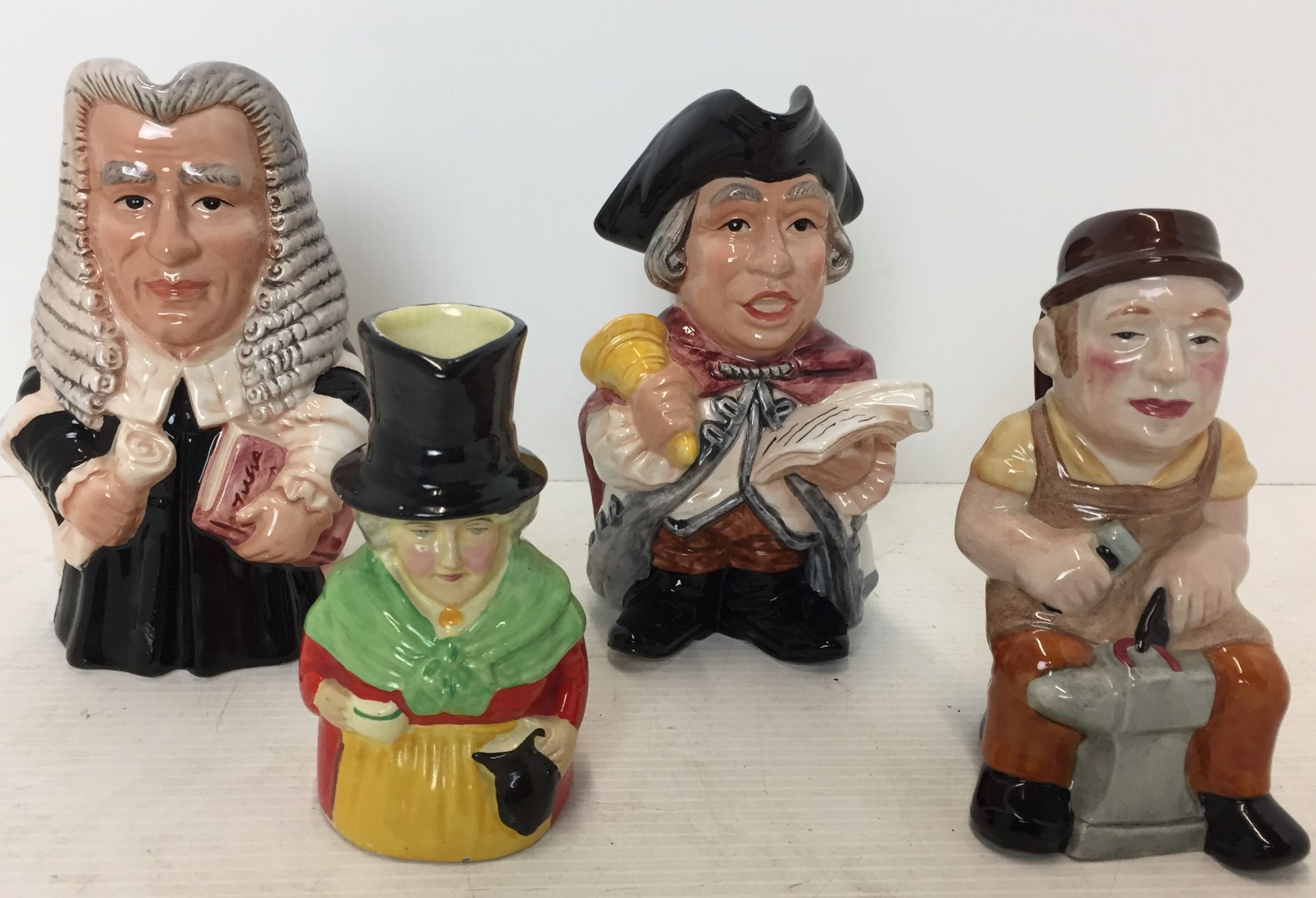 Four toby jugs Leonardo - Judge & Town Cryer 16cm high,