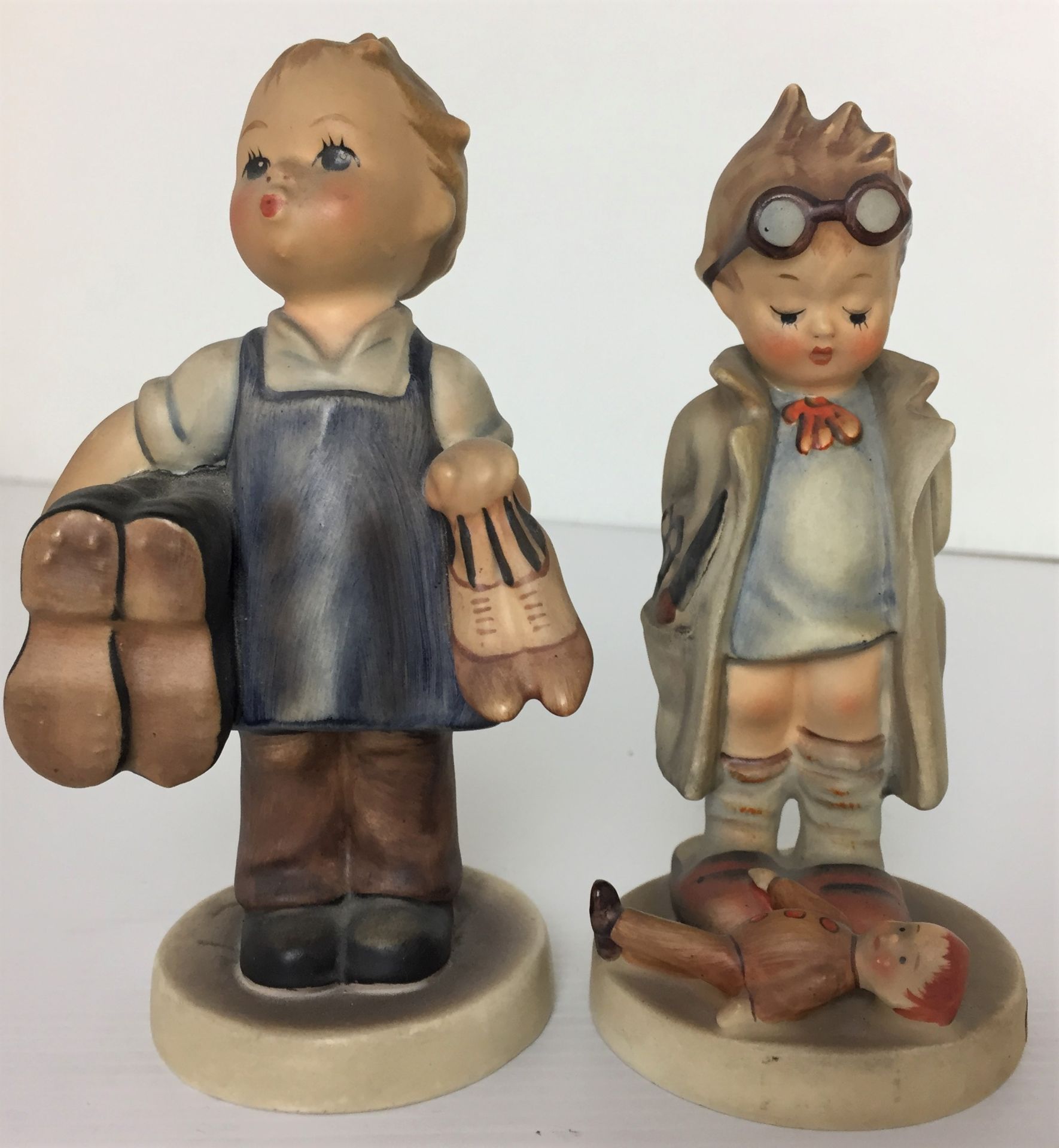 Two Goebel figurines Boots and Doctor max 13cm high Y10