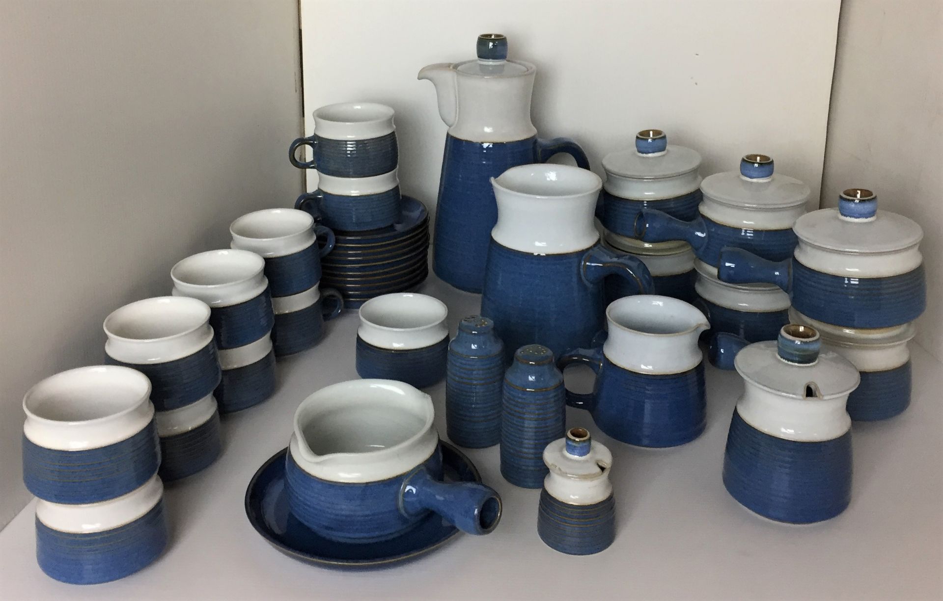 Thirty five pieces unmarked blue & white stoneware including ten cups and saucers,