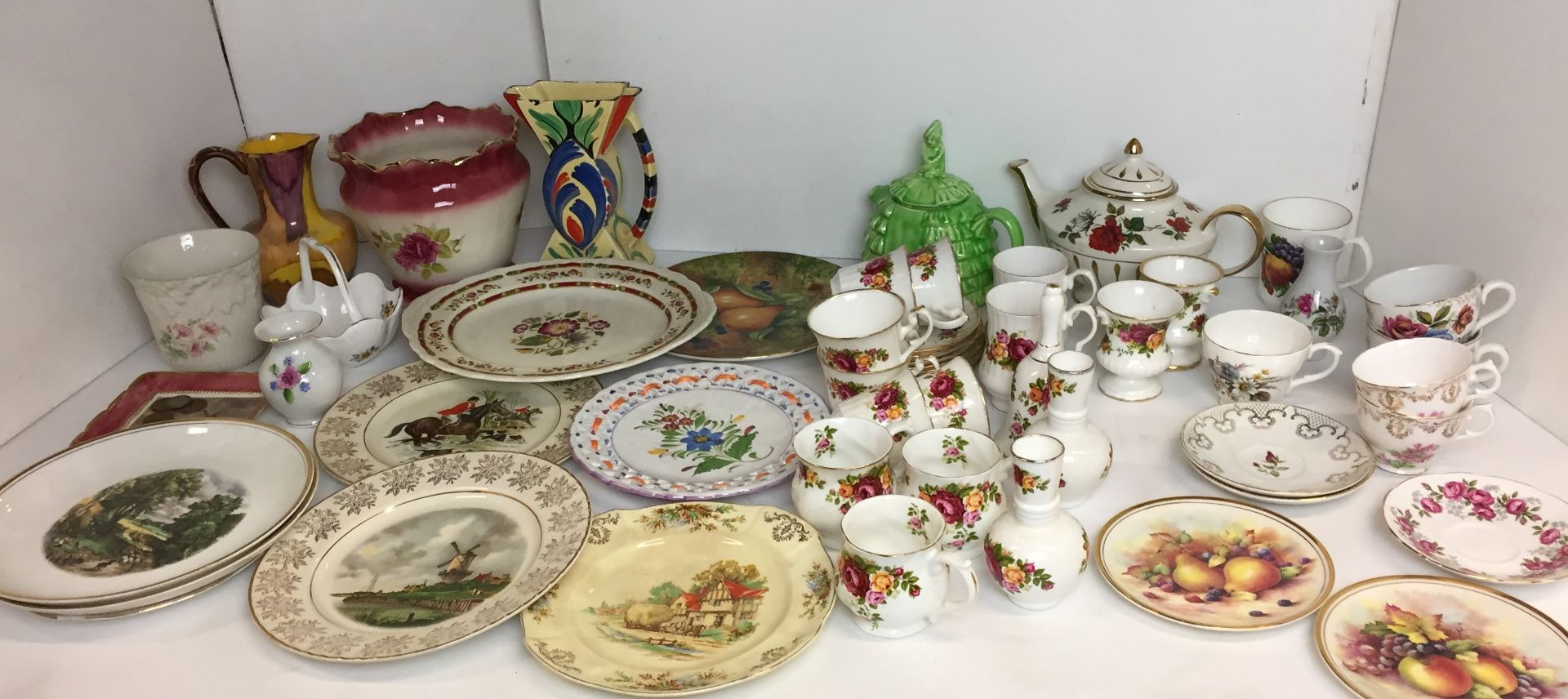 Fifty plus ceramic items including twenty three pieces of similar roses design china by Royal