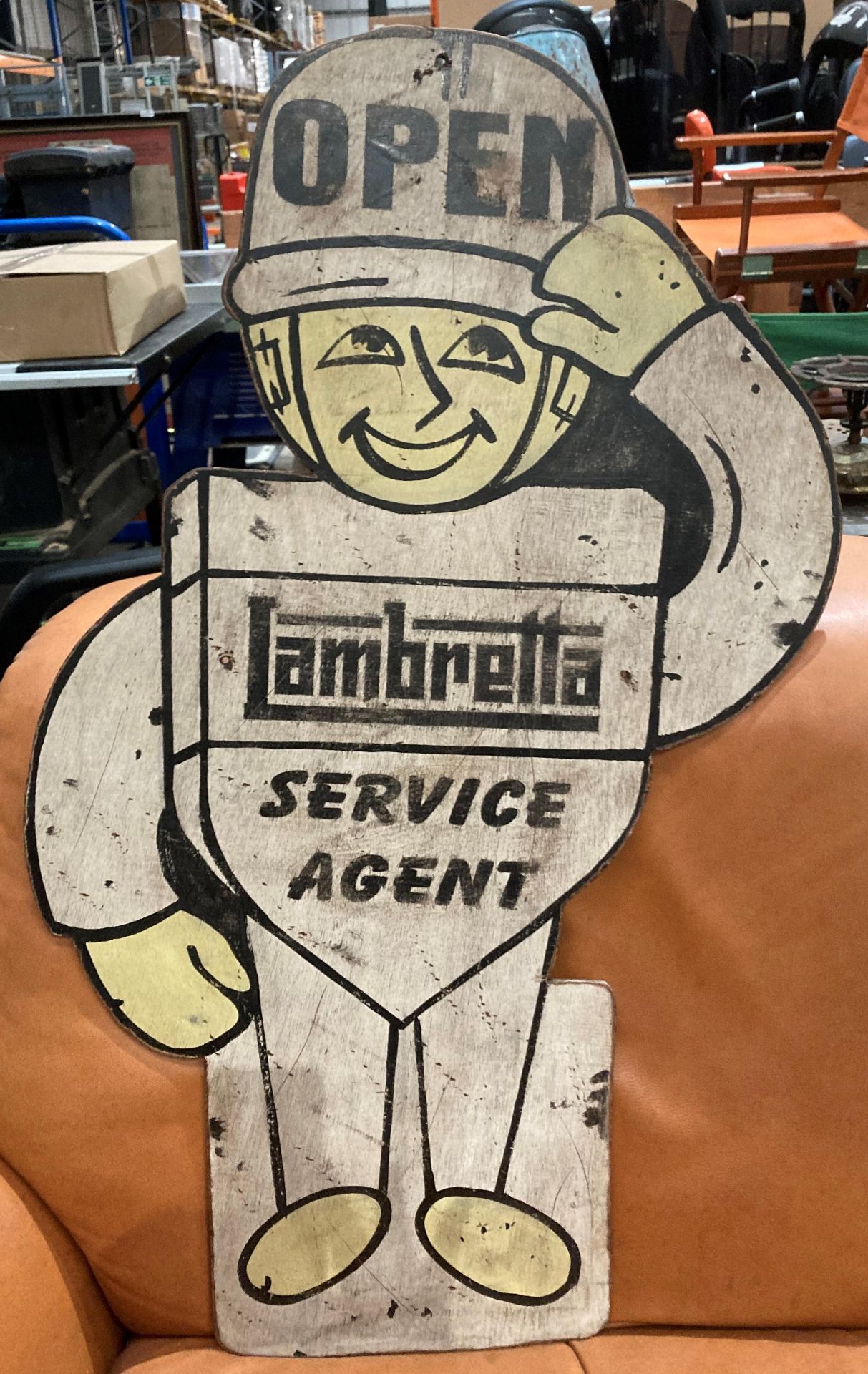 A reproduction painted sign on plywood 'Open Lambretta Service Agent' 92cm Further