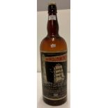 An empty six pint bottle labelled Windjammer Finest Old Demerara Rum.