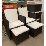 Black plastic woven garden furniture comprising two armchairs and five square tables/stools with