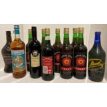 Seven 70cl bottles of Tudor Rose Cream British wine, an old 70cl bottle of Babycham,