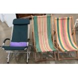 Two wood framed folding deck chairs with striped fabric seats and a chrome folding deck chair with