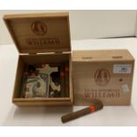 A wood box containing 50 Willem II Extra Senoritas Dutch cigars and a box containing eight Willem