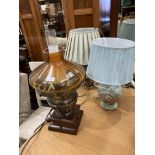 A bronze finish on wood base table lamp with glass shade and two other table lamps (oil lamp -
