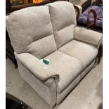 An Oaktree mobility oatmeal upholstered two seater settee (S2)