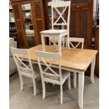 A pine finish top dining table 150cm x 90cm together with five cream dining chairs with mushroom