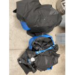 Two bags containing approximately seventy black Wensum Dignity waistcoats assorted sizes,