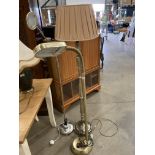 A bronze finish standard lamp with shade,