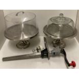 Three items - a 52cm long catering can opener and two cake stands 33cm dia (one odd lid) (T03)