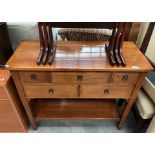 A polished pine five drawer side unit with undertray - 93cm