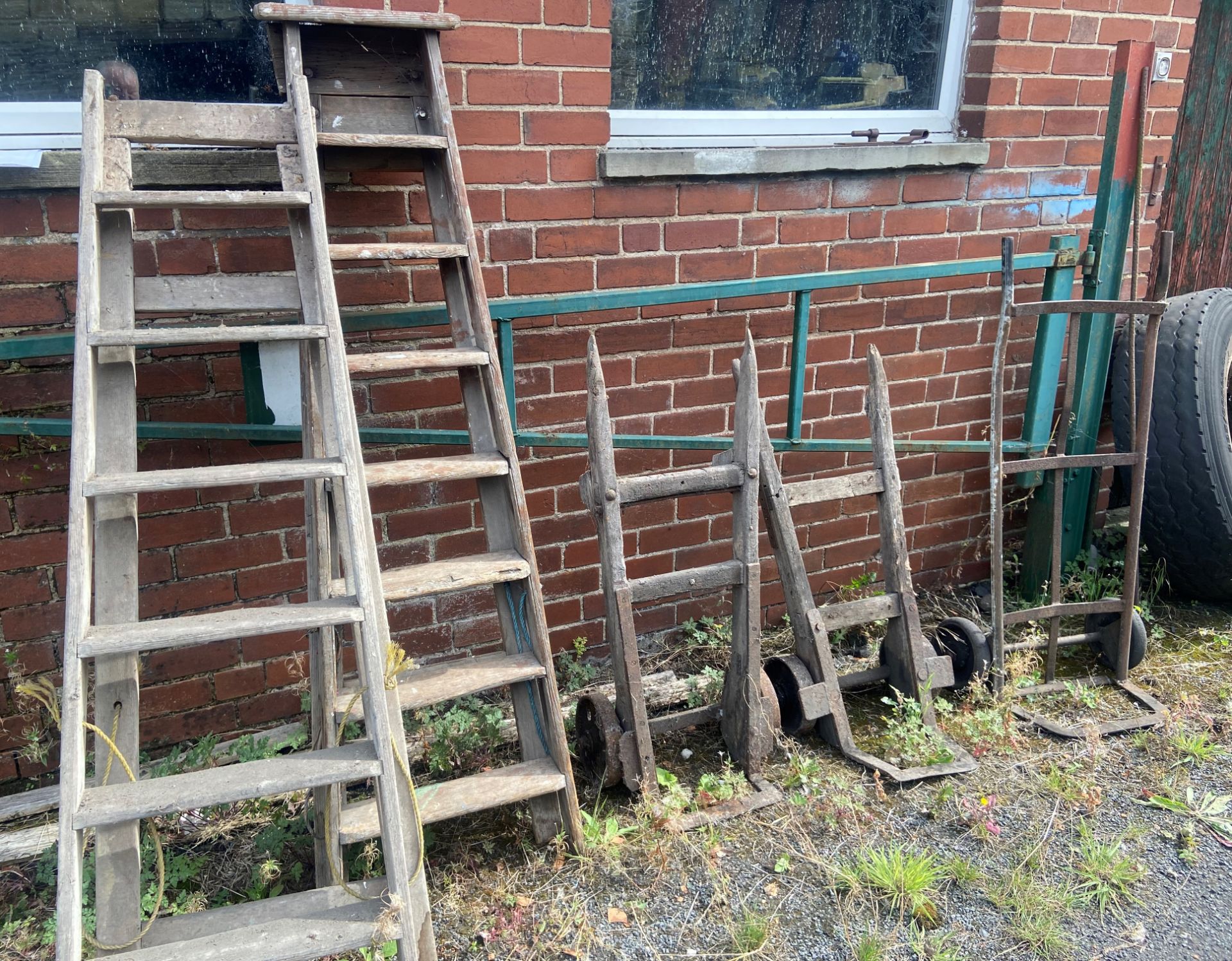 5 items - 2 x 7 tread wooden step ladders and 3 metal/wood sack carts.